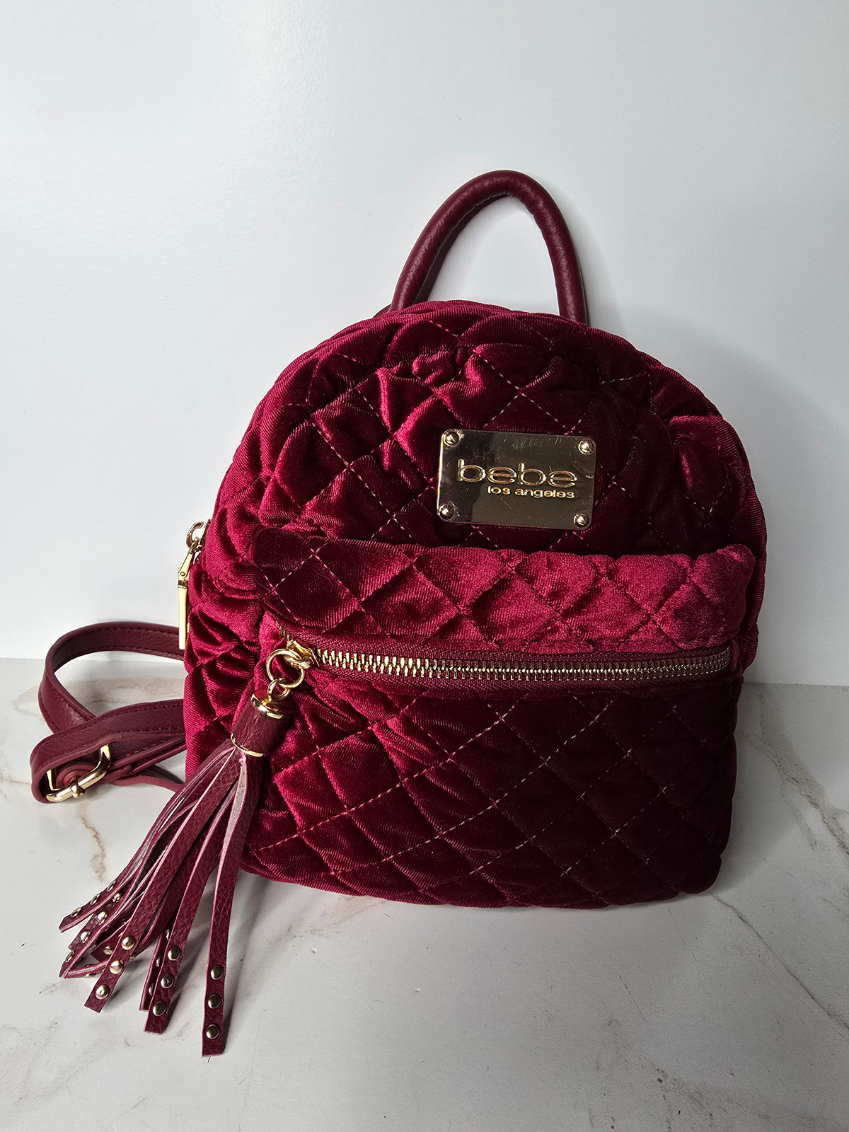 bebe Burgundy Velvet Quilted Mini Backpack